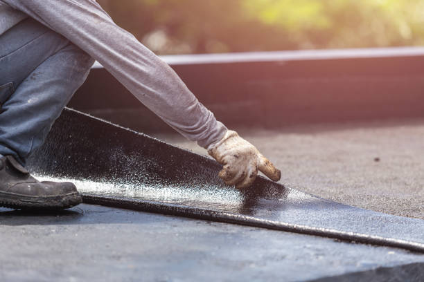 Professional Waterproofing technician working in Arcadia, IN